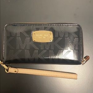 Michael Kors black and gold wallet wristlet